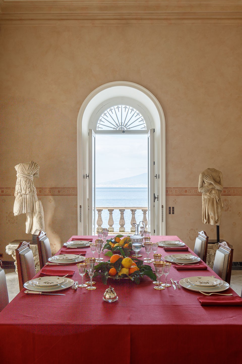 Villa Astor best exquisite dinning room marble table luxury linen glasses table setting decor decoration Italian fruit wine food breathtaking view The Heritage Collection