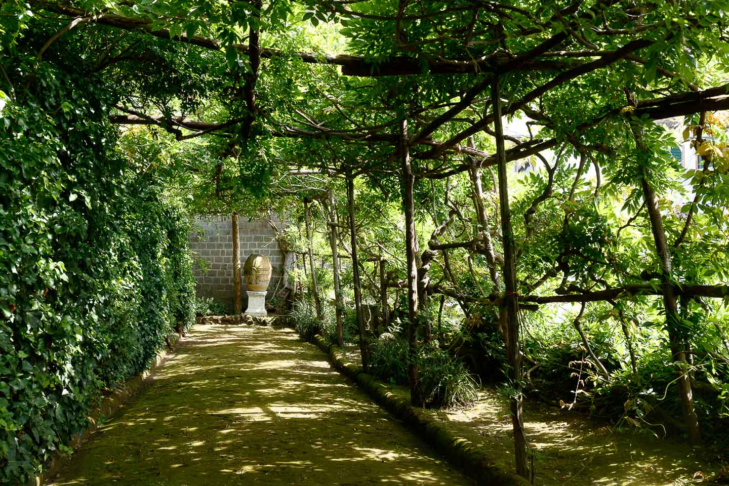 Villa Astor residence Benedetto Croce Sorrento luxury accommodation beautiful garden walkway antique urn 11